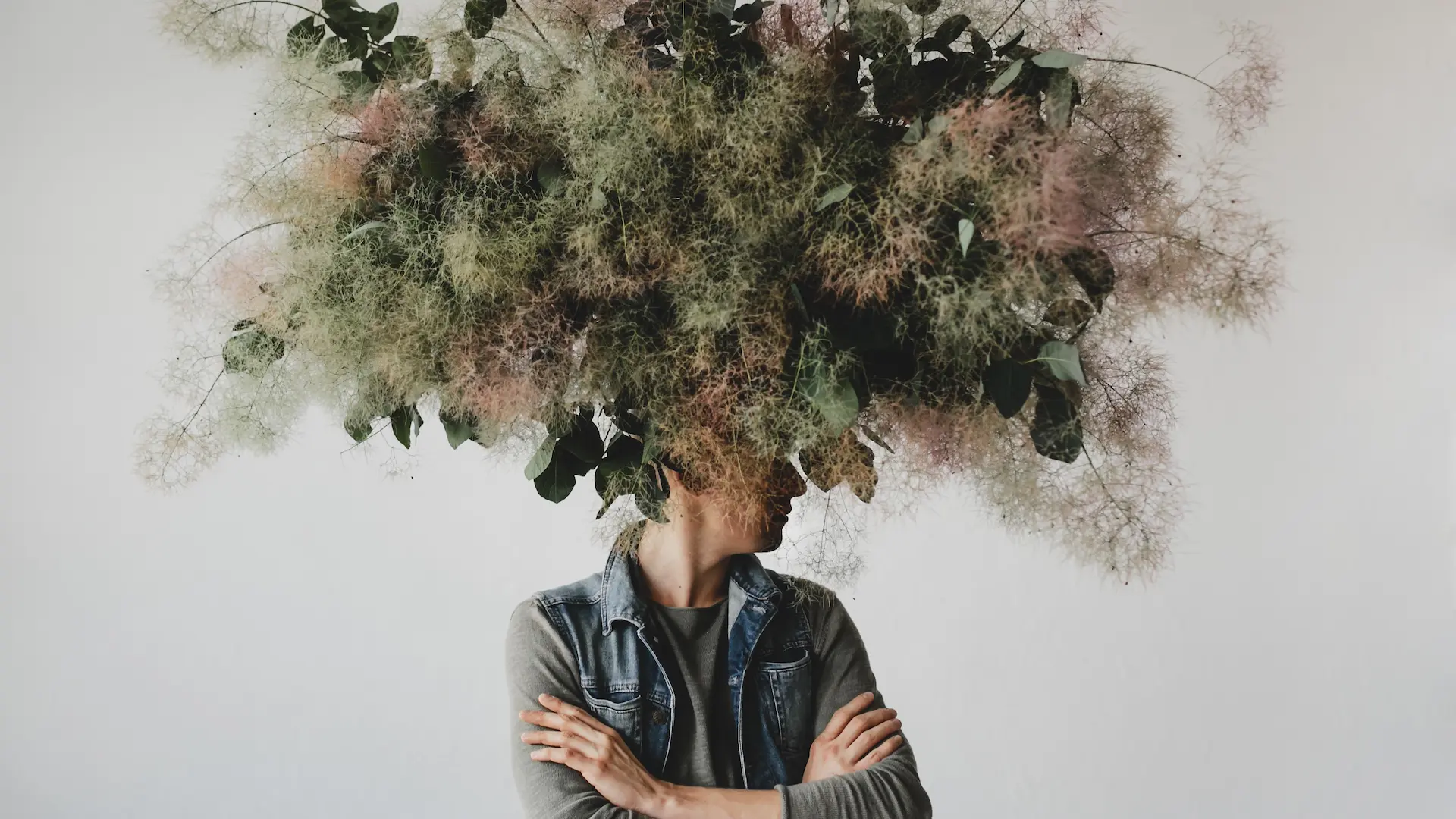 large-decorative-bouquet-made-green-leaves-moss-hangs-man-s-head